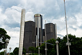 A View Of The General Motors Building In Detroit, Michigan With Cloudy Skies Above