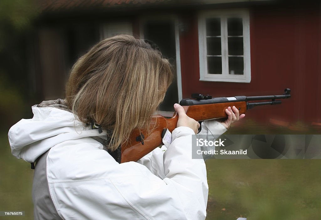 Kobieta z pistoletu - Zbiór zdjęć royalty-free (Broń palna)