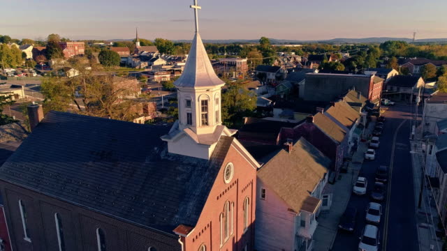 The scenic view of the small Pennsylvanian town Bath at sunset. Appalachian mountains, Pennsylvania, USA. Aerial drone video with the forward camera motion.
