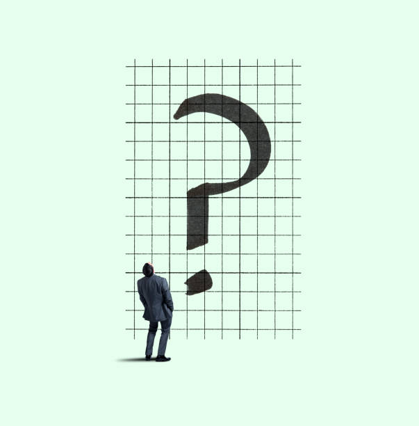 istock Businessman Looks Up At Question Mark On Chart 1167655137