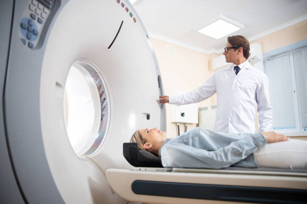 istock Young lady having CT scan in hospital 1167655689
