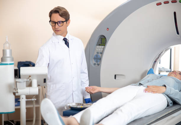 istock Radiology technologist performing CT scan test at hospital 1167655746