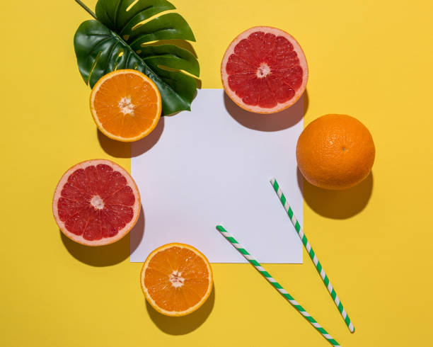 istock Creative fruit composition on yellow background with hard shadows. Summer minimal concept. 1167656663