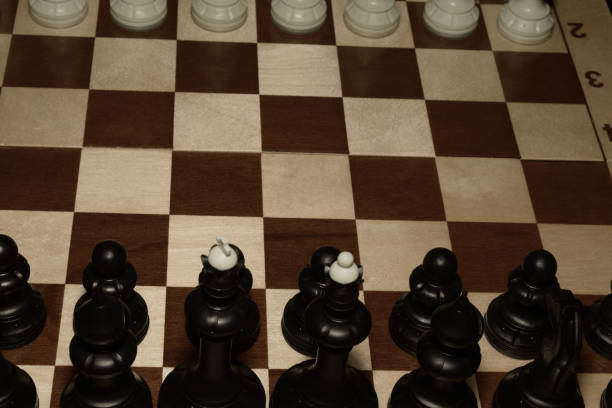 istock Chechered board and white pawns like a skill concept 1167658538