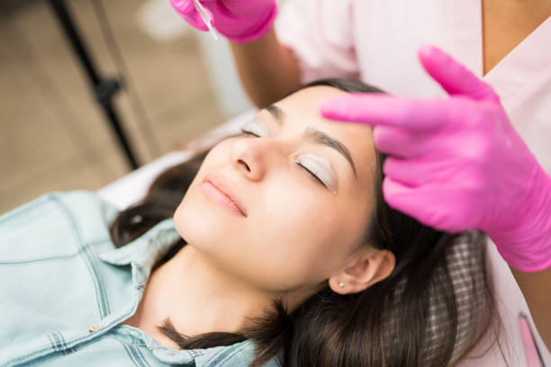istock Female Customer Getting Eyelashes Extension At Spa 1167658556