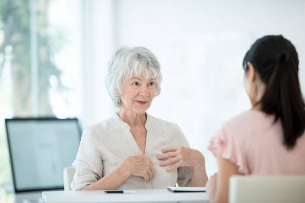 istock Senior woman meets with her physician 1167663941