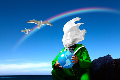 The fisherman's hands hold a blue ball with a world map. The background is a clean blue sky and rainbow and seabirds.
Plastics become micro plastic particles by waves and ultraviolet rays and are present in seas around the world.
Aggravated plastic waste and dumping and micro plastic marine pollution.