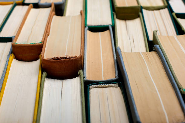 istock Old and used hardcover books. Educational concept. Closeup 1167685895