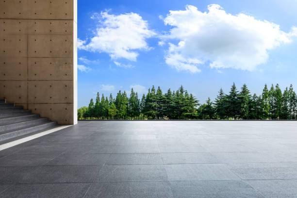 istock Empty square floor and green woods natural scenery 1167691787