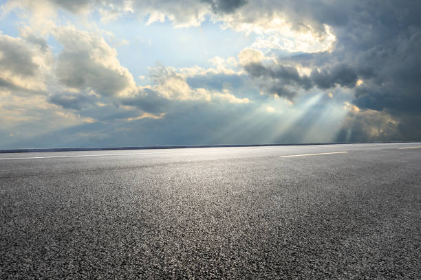istock Asphalt road and beautiful sky clouds landscape 1167696510