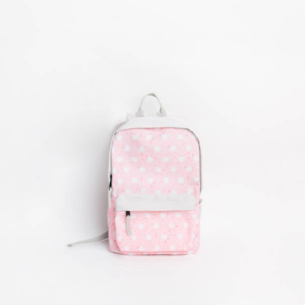 istock new stylish pink school backpack on white background 1167696582