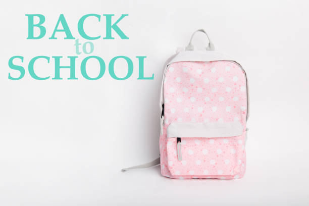 istock new stylish pink school backpack on white background 1167696591