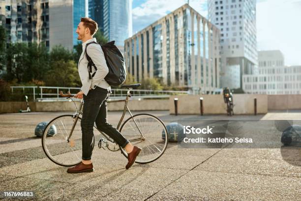 Time To Kick This Workday Into High Gear Stock Photo - Download Image Now - Cycling, Walking, City