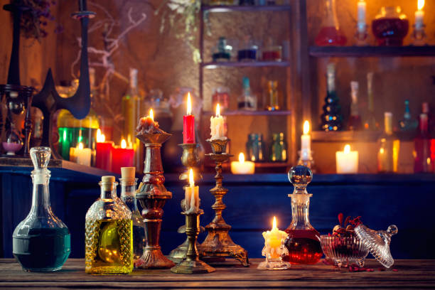 istock magic potions in bottles on wooden background 1167700121