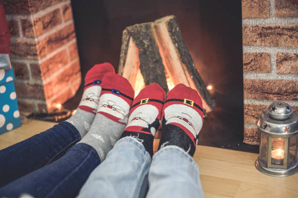 istock Couple feet in front of fire 1167703233