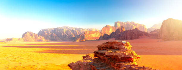 istock Panoramic Approach to Wadi Rum - Desert by Sunrise 1167704120