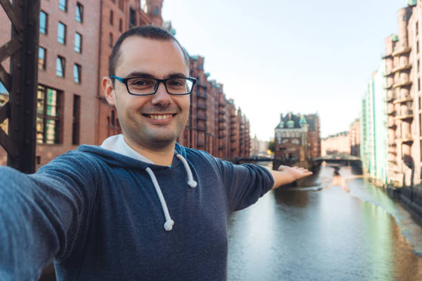istock Man making selfie in Hamburg old town 1167704905