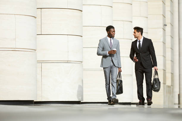 istock Two partners walking in the city 1167705330
