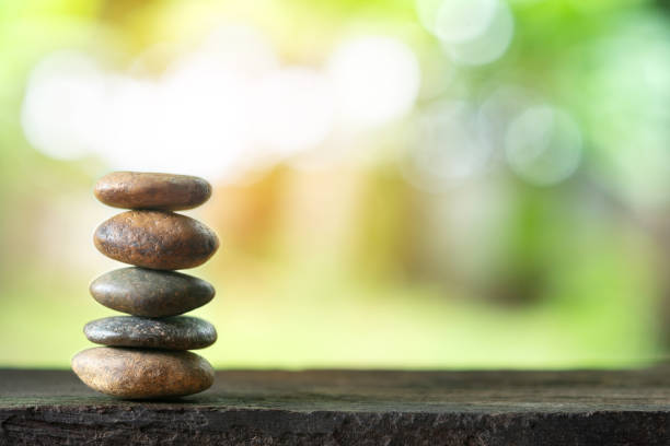 istock Balance stone with spa on abstract bokeh background 1167706089