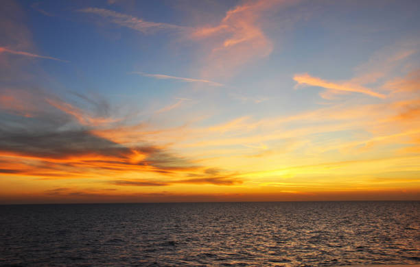 istock Sunset colors and clouds in the evening sky. 1167707164