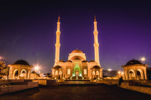 istock TAIMUR MOSQUE architectural front view in the evening time with yellow lights. 1167707329
