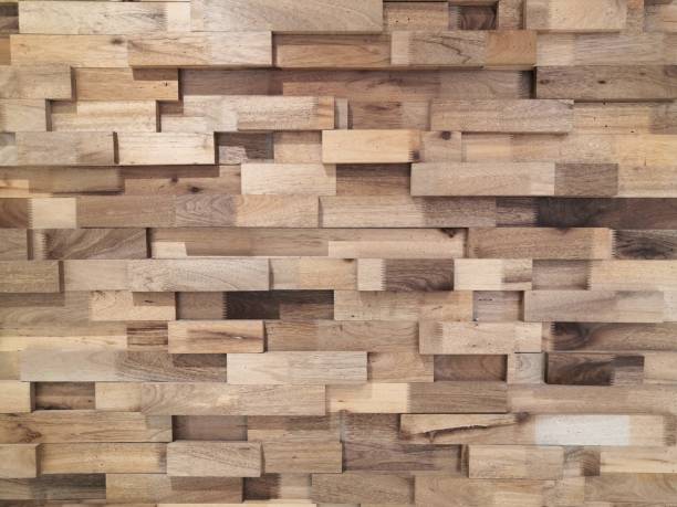 Reclaimed timber for a modern look.Reclaimed wood Wall Paneling texture background.Layered wood plank wall decoration.
