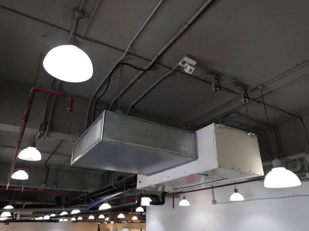 Installation of Air handing unit or Fan coil unit with Duct and supply Air Grille in loft office Installation of Air handing unit or Fan coil unit with Duct and supply Air Grille in loft office MEP services stock pictures, royalty-free photos & images