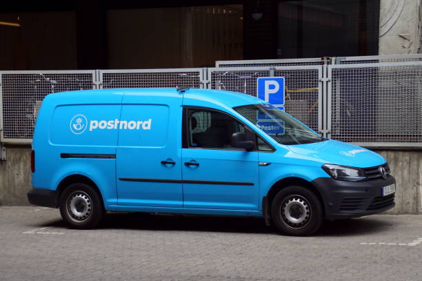 Blue PostNord delivery van. stock photo