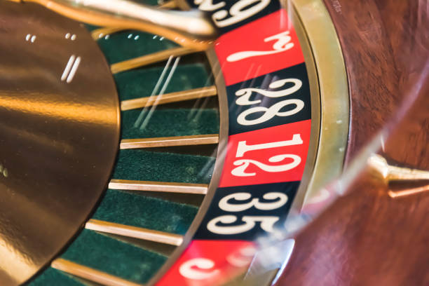 istock Roulette wheel in a dark casino 1167710829