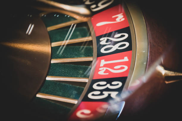 istock Roulette wheel in a dark casino 1167710852