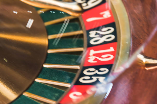 istock Roulette wheel in a dark casino 1167710944