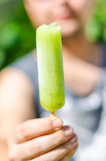 istock frozen juice in a guy's hand 1167714760