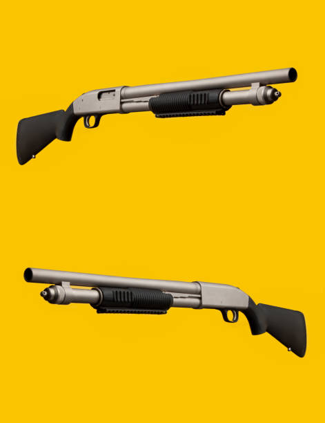 istock Silver-black shotgun on a yellow background. 1167716810