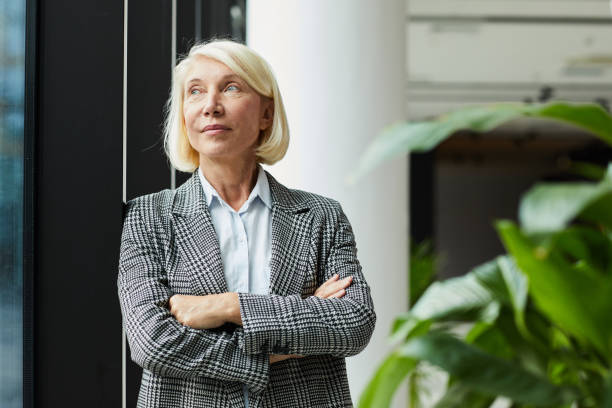 istock Mature female leader at office 1167718432