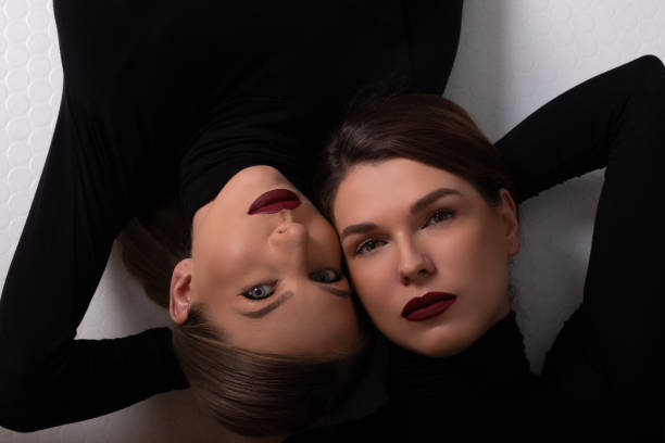 istock Portraits: Two Fashion Models Posing at the photo studio 1167718445