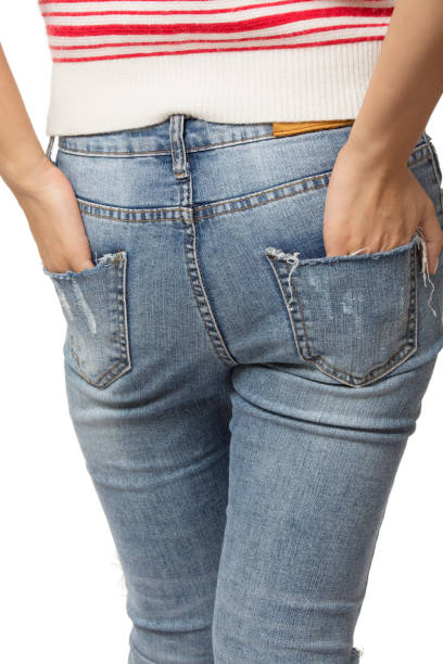 istock Female hands in her back pockets isolated on white background 1167718741