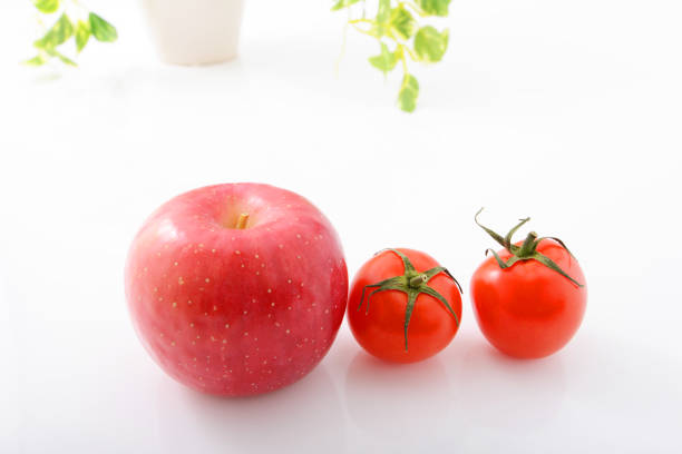 Fresh fruits and vegetables isolated on white background
