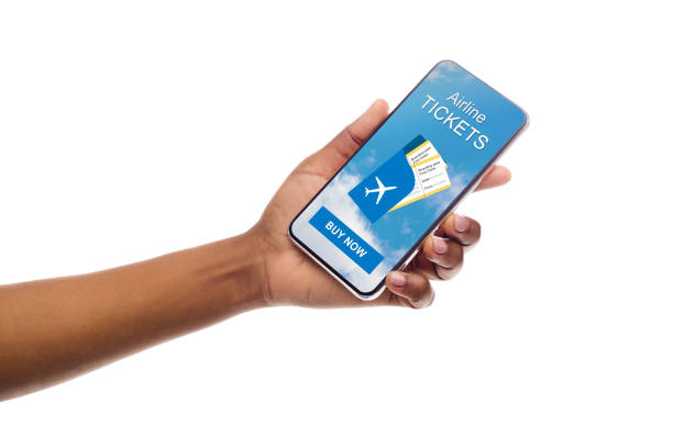 istock Application for booking flights on cellphone in black female hand 1167723799