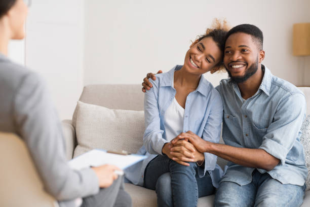 istock Afro Spouses Hugging Happily After Reconciling On Marital Counseling 1167724129