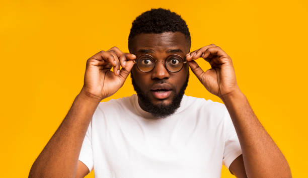 istock Man showing his big eyes in glasses, posing to camera 1167724462
