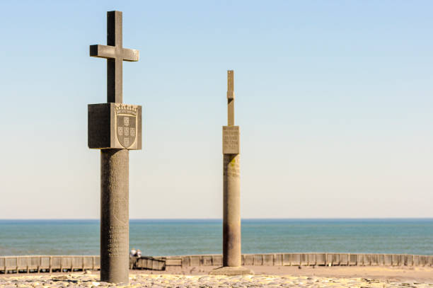 Ostend, Belgium - July 14, 2014: Seamen's Memorial on the beach constructed in 1953. Each year the numerous fishermen from Oostende who died at sea are commemorated. This was also the location of the first lighthouse in Oostende (1771). 