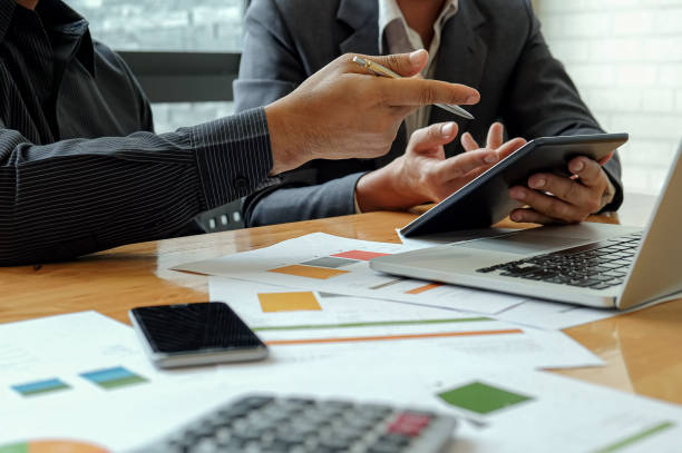 istock Management team work on tablet to summarize work to achieve organizational goals. 1167725414