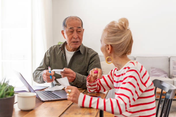 istock Senior Couple Looking After Their Finances at Home 1167727879