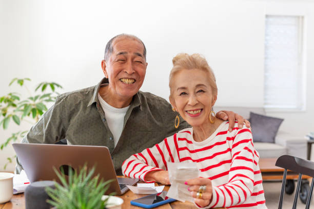 istock Senior Couple Looking After Their Finances at Home 1167727882