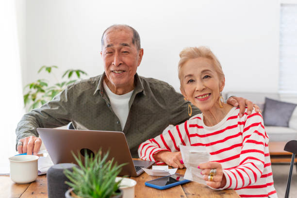 istock Senior Couple Looking After Their Finances at Home 1167727967