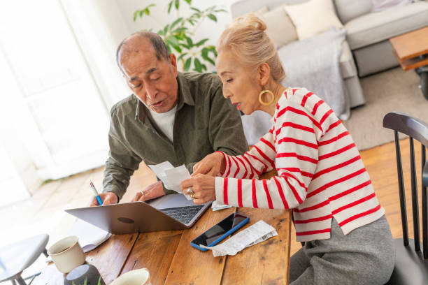 istock Senior Couple Looking After Their Finances at Home 1167727973