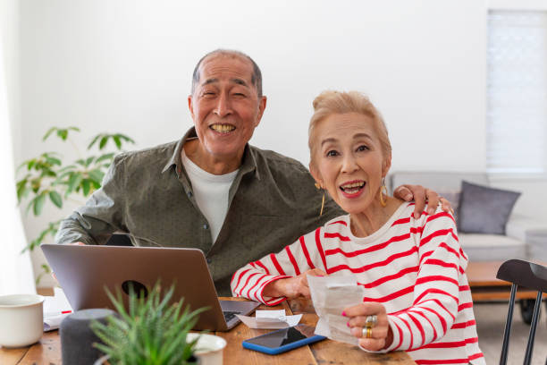 istock Senior Couple Looking After Their Finances at Home 1167727975