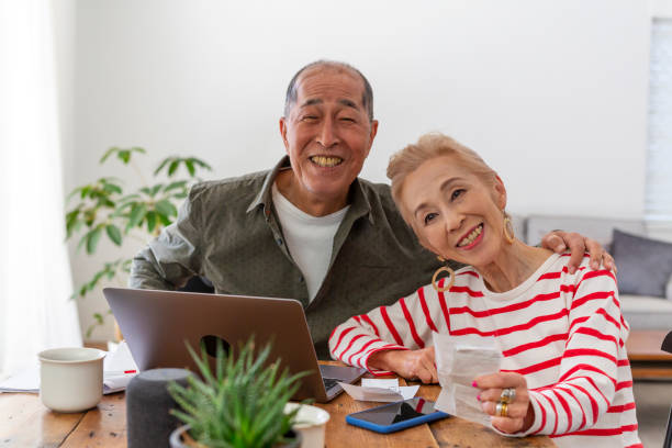 istock Senior Couple Looking After Their Finances at Home 1167727976
