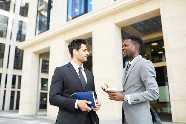 istock Two businessmen standing in the city 1167728179