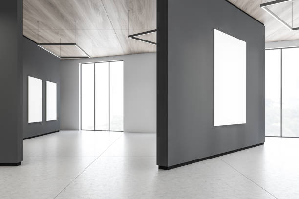 istock Gray and white gallery with posters 1167733579